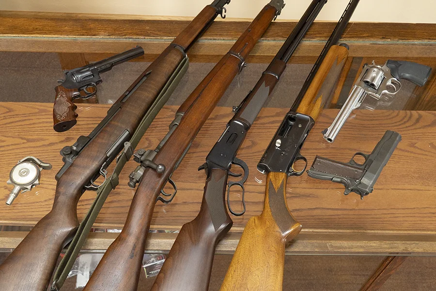 Collection of used firearms available to sell at Ron’s Gun Shop